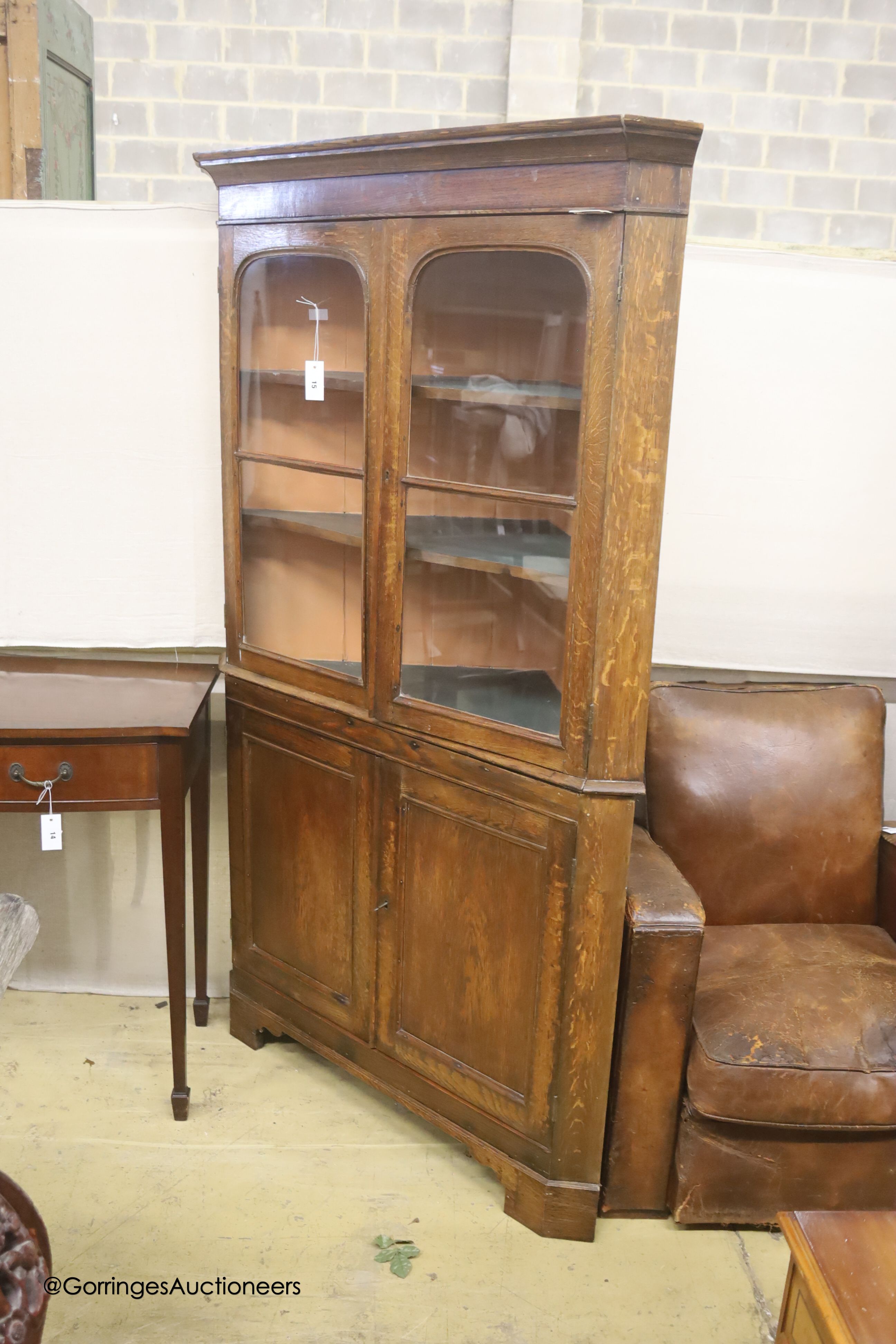 A 19th century oak standing corner cupboard, width 112cm, depth 51cm, height 190cm